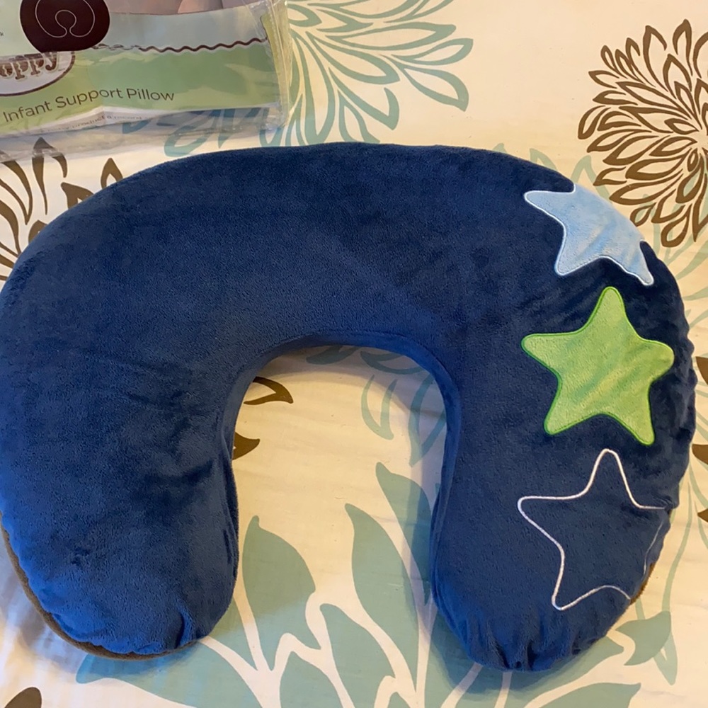 Boppy pillow with cover. Feeding and infant support pillow.